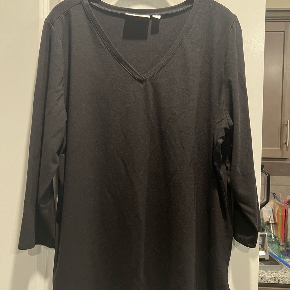 NWOT. Ladies Tunic Top by Kim Gravel. Size Large and Black in color.